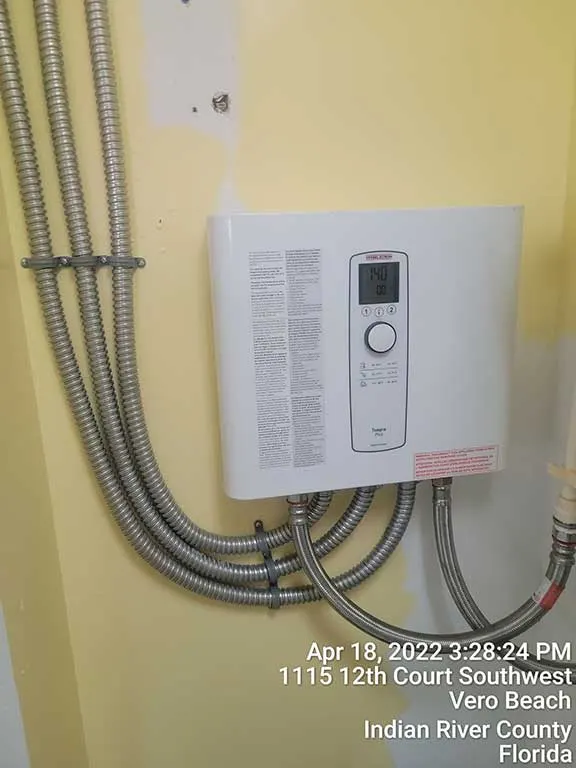 A tankless water heater installation wired by Ehman Electric